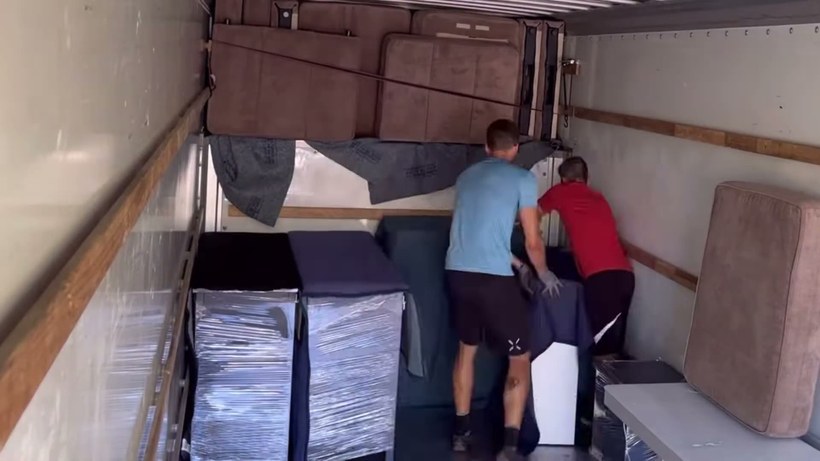 Tony the Mover crew handling a piece on a Metro Detroit job